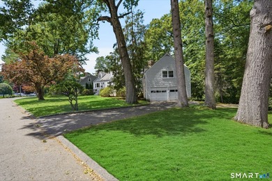 Privately sited on a flat .39-acre lot with mature landscaping - photo 3