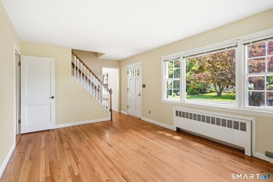 Privately sited on a flat .39-acre lot with mature landscaping - photo 7