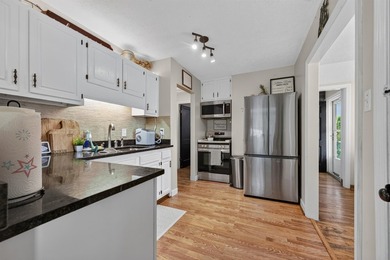 Welcome Home! This charming 1.5-story bungalow is situated on a - photo 20