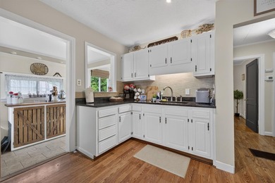 Welcome Home! This charming 1.5-story bungalow is situated on a - photo 22