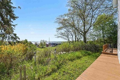 VIEWS! Stunning Lake Charlevoix views on a 1+ acre property - photo 5