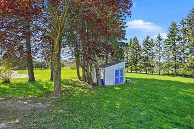 VIEWS! Stunning Lake Charlevoix views on a 1+ acre property - photo 10