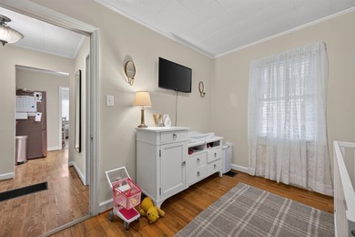 Welcome Home! This charming 1.5-story bungalow is situated on a - photo 32