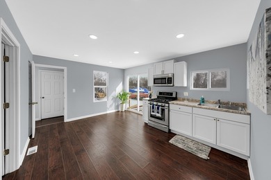 Charming, fully-renovated home on awaits! NEW flooring, NEW - photo 14