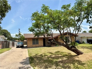 Welcome to this conveniently located 3-bedroom, 2-bath home - photo 1