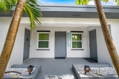 This fully occupied multi-family gem in Dania Beach features a - photo 14