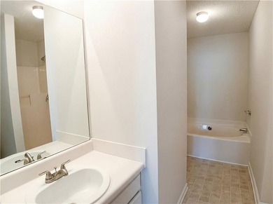 Beautiful and spacious corner unit townhome featuring an open - photo 10