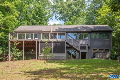 Lake front contemporary with renovated kitchen and screened - photo 3