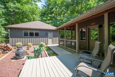 Lake front contemporary with renovated kitchen and screened - photo 8
