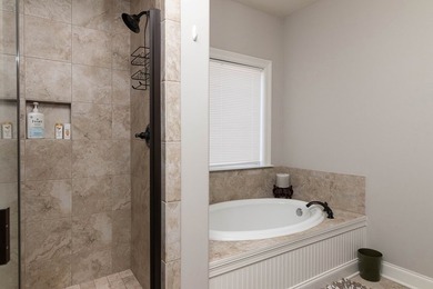 Tucked into The Lakes subdivision on 1.9 acres that includes - photo 13