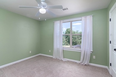 Tucked into The Lakes subdivision on 1.9 acres that includes - photo 15