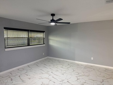 Beautifully remodeled concrete block 4/2 home with a new metal - photo 7