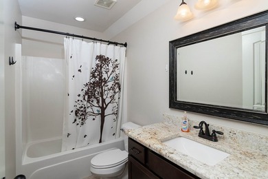 Tucked into The Lakes subdivision on 1.9 acres that includes - photo 19