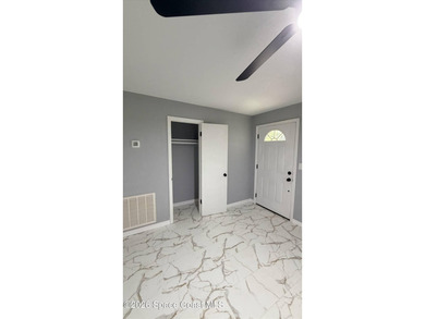 Beautifully remodeled concrete block 4/2 home with a new metal - photo 9