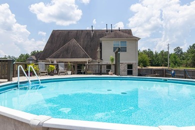 Tucked into The Lakes subdivision on 1.9 acres that includes - photo 23