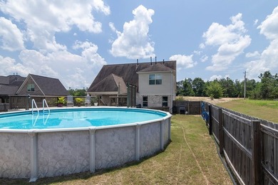 Tucked into The Lakes subdivision on 1.9 acres that includes - photo 26