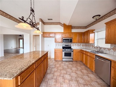 This Corpus Christi two-story home offers a patio, and a two-car - photo 7
