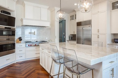 This exquisite 5-bedroom, 4 and half-bathroom residence offers - photo 8