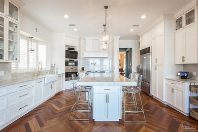 This exquisite 5-bedroom, 4 and half-bathroom residence offers - photo 9