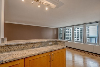 Enjoy lake views from this spacious 860 sq. ft. 1-bedroom condo - photo 8