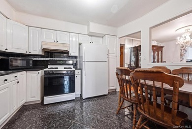 Beutifully Renovated 2 Family High Ranch, 6 Bedrooms, 4 Full - photo 7