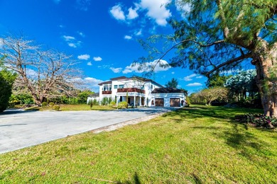 Situated on an expansive 2.23-acre estate, this exceptional - photo 18