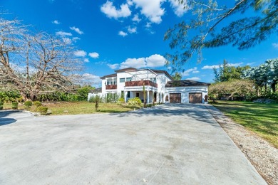 Situated on an expansive 2.23-acre estate, this exceptional - photo 19