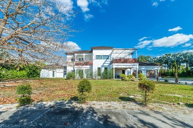 Situated on an expansive 2.23-acre estate, this exceptional - photo 20