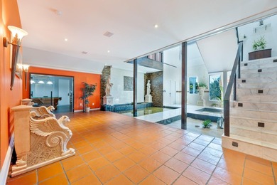 Situated on an expansive 2.23-acre estate, this exceptional - photo 22