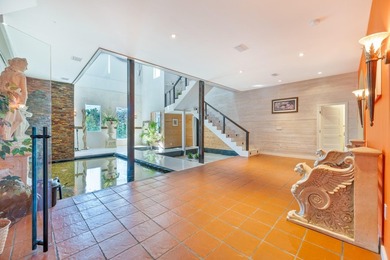 Situated on an expansive 2.23-acre estate, this exceptional - photo 23