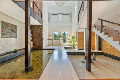 Situated on an expansive 2.23-acre estate, this exceptional - photo 24