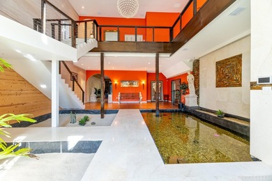 Situated on an expansive 2.23-acre estate, this exceptional - photo 25