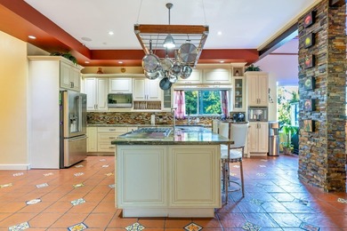 Situated on an expansive 2.23-acre estate, this exceptional - photo 34