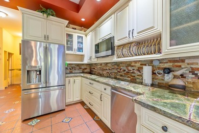 Situated on an expansive 2.23-acre estate, this exceptional - photo 36