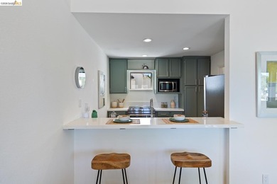 A beautifully updated reverse floor plan condo offering an - photo 19