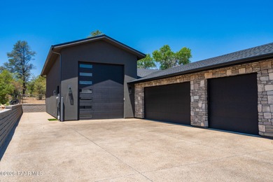 Stunning single level custom home on almost an acre in town!