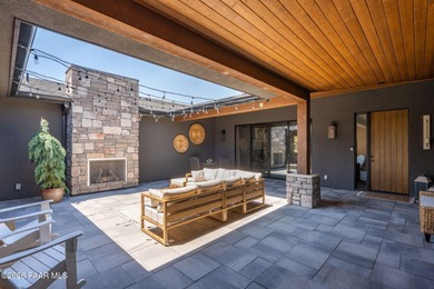 Stunning single level custom home on almost an acre in town!