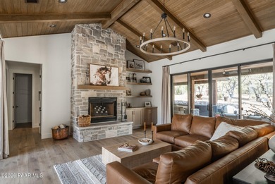 Stunning single level custom home on almost an acre in town!