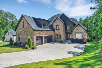 Located in the highly sought-after Norman Pointe community, this - photo 1