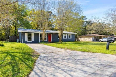 This beautifully updated 4-bedroom, 1.5-bath home offers the - photo 3