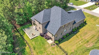 Located in the highly sought-after Norman Pointe community, this - photo 4