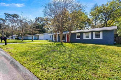 This beautifully updated 4-bedroom, 1.5-bath home offers the - photo 4