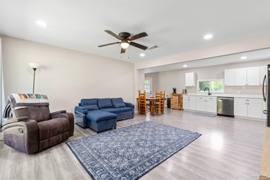 This beautifully updated 4-bedroom, 1.5-bath home offers the - photo 5