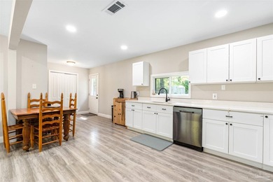This beautifully updated 4-bedroom, 1.5-bath home offers the - photo 6