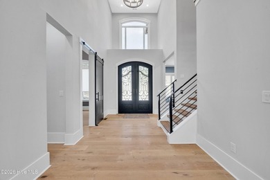 Located in the highly sought-after Norman Pointe community, this - photo 7