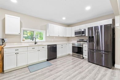 This beautifully updated 4-bedroom, 1.5-bath home offers the - photo 7