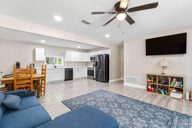 This beautifully updated 4-bedroom, 1.5-bath home offers the - photo 9