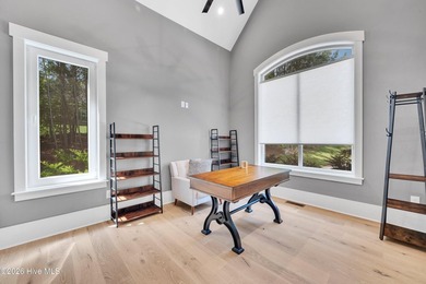 Located in the highly sought-after Norman Pointe community, this - photo 10
