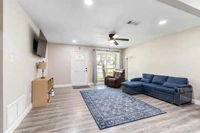 This beautifully updated 4-bedroom, 1.5-bath home offers the - photo 10