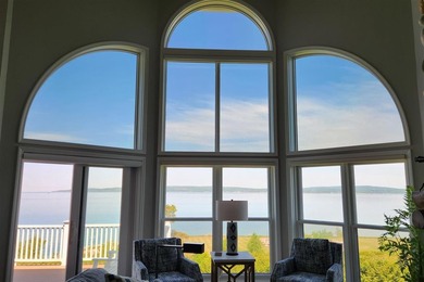 Perched above the Lake Michigan shoreline, this stunning - photo 1